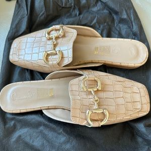 Never worn. Tan mules